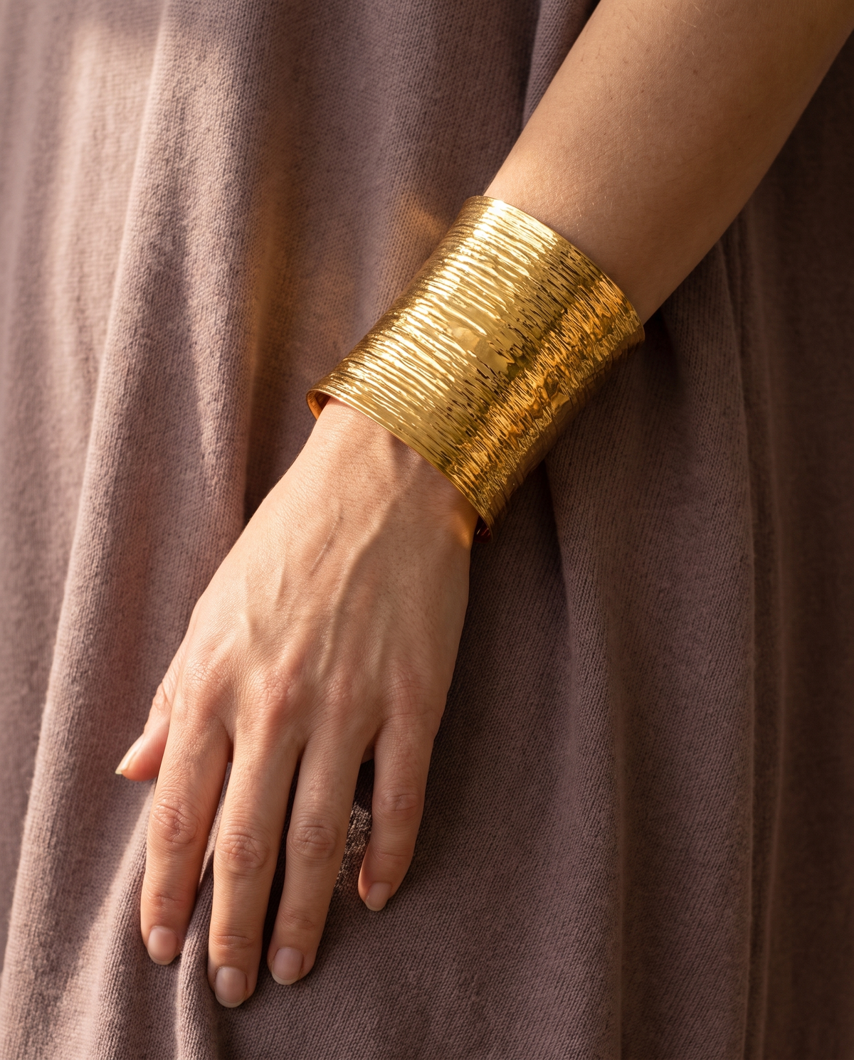 Statement Wide Cuff Bracelet, Gold finish, worn on wrist