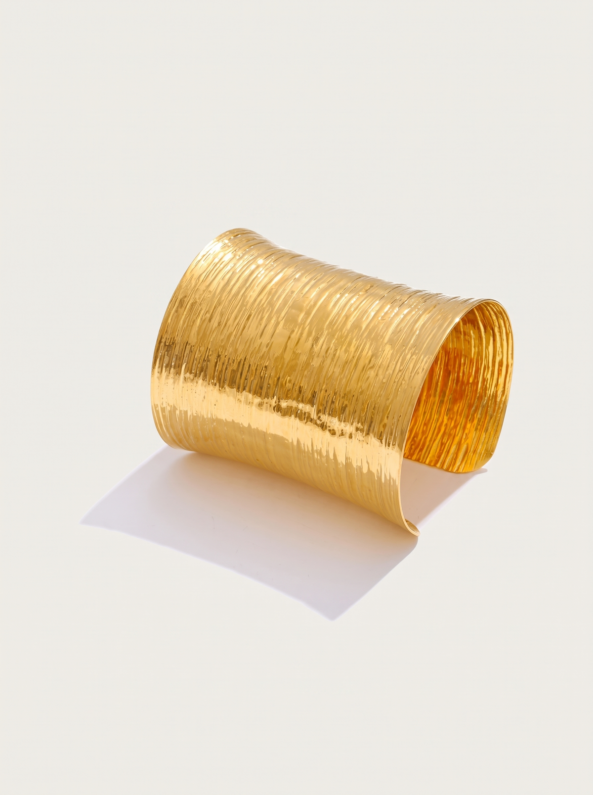 Statement Wide Cuff Bracelet, Gold finish, studio product shot