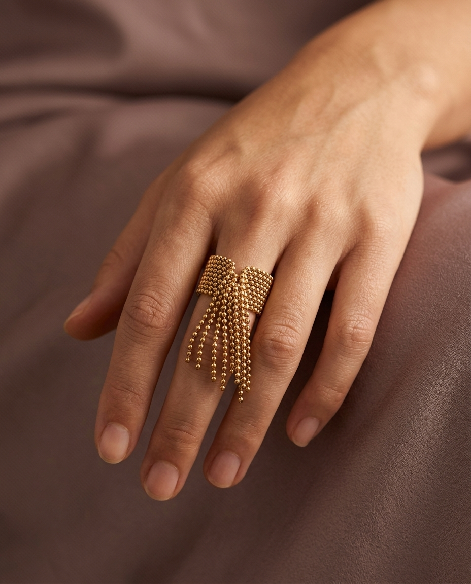 Beaded Tassel Ring, Gold finish, worn on a relaxed hand