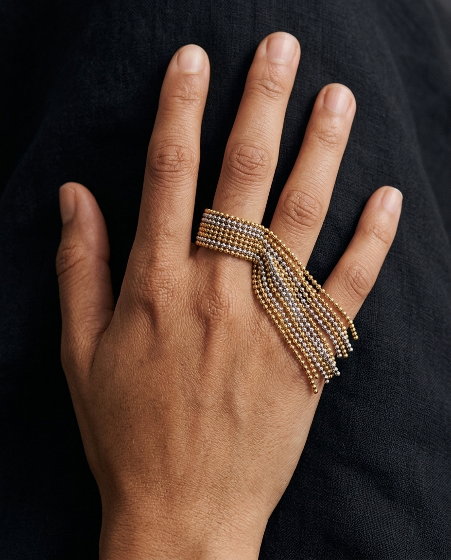 Beaded Tassel Ring, Two-Tone finish, worn on a relaxed hand