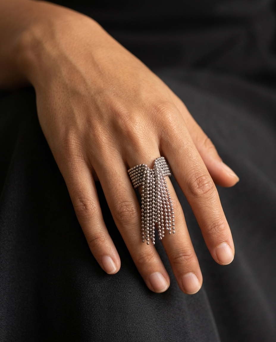 Beaded Tassel Ring, Silver finish, worn on a relaxed hand
