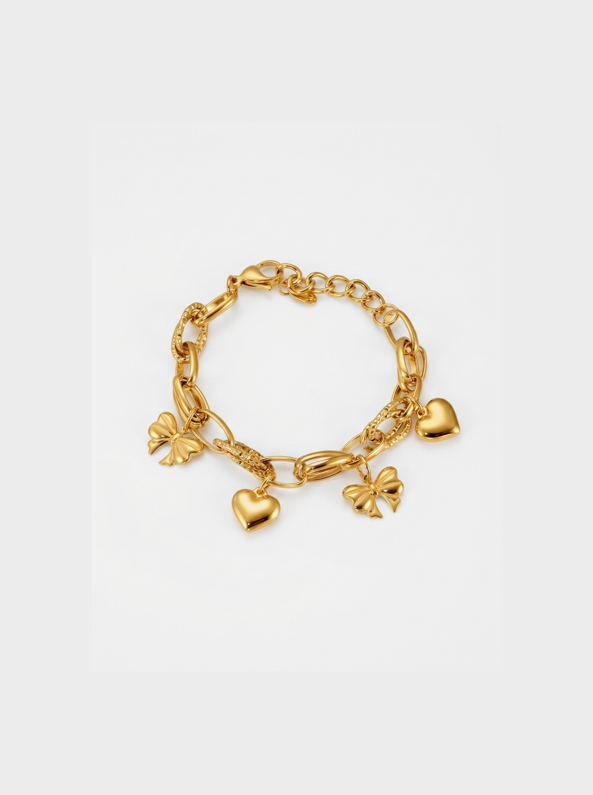 Heart and Bow Charm Bracelet, Gold finish, studio product shot