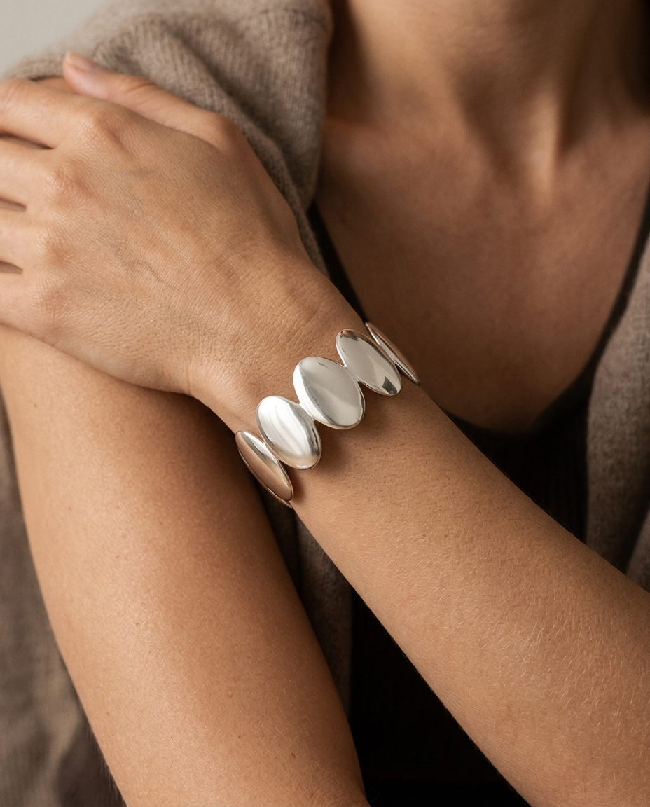 Sculpted Wave Cuff Bracelet, Silver finish, worn on wrist