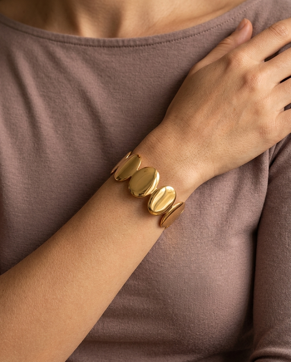 Sculpted Wave Cuff Bracelet, Gold finish, worn on wrist