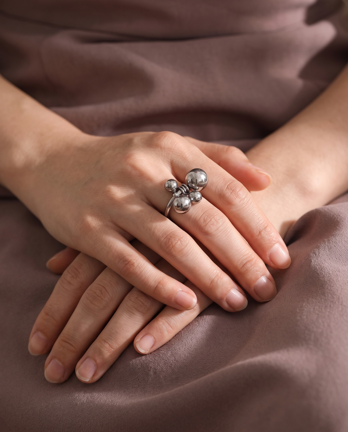 Sphere Cluster Ring, Silver finish, worn on a relaxed hand