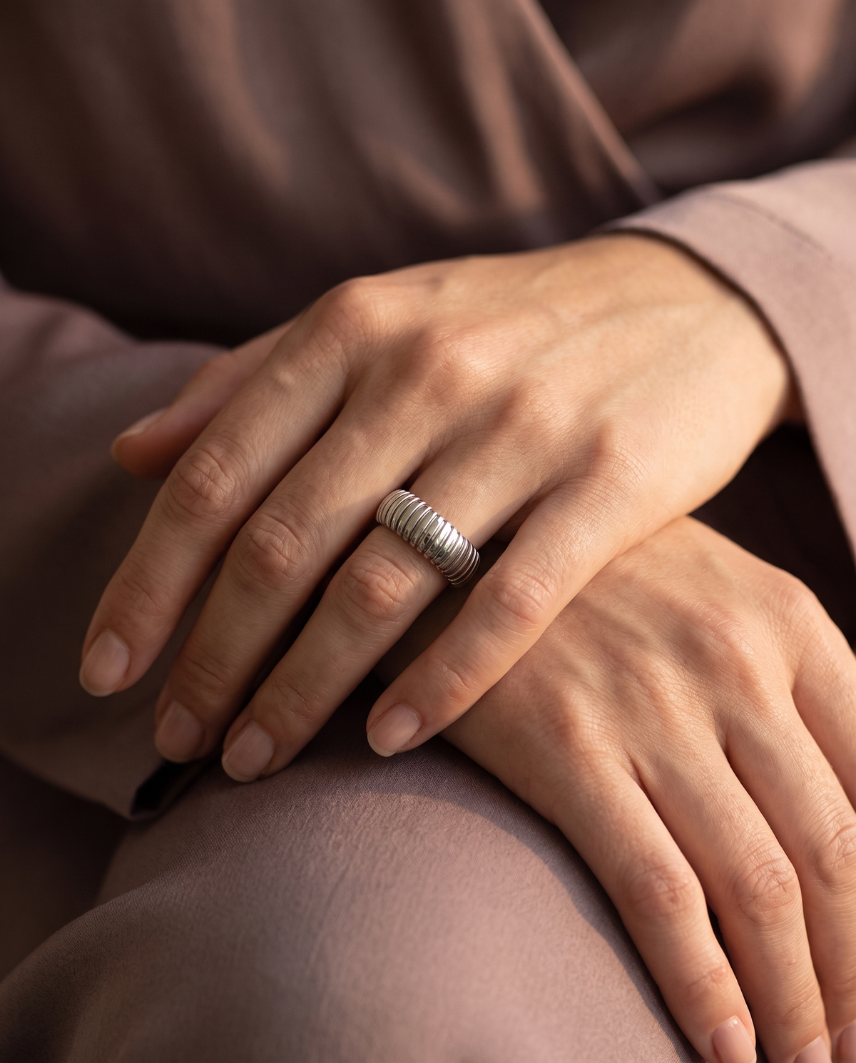 Tubogas Open Ring, Silver finish, worn on a relaxed hand